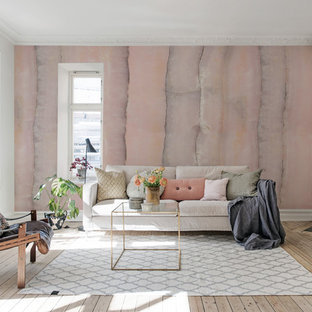 Inspiration för minimalistiska separata vardagsrum, med ett finrum, rosa väggar, ljust trägolv, en öppen hörnspis, en spiselkrans i sten och beiget golv