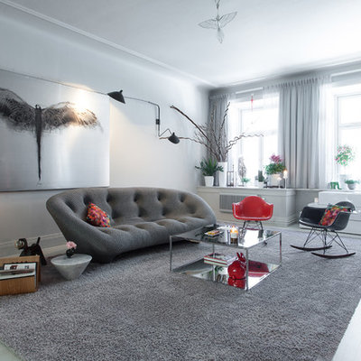 Inspiration for a large scandinavian open concept painted wood floor living room remodel in Stockholm with white walls, no fireplace and no tv