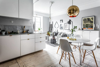 Idéer för mellanstora skandinaviska vardagsrum, med grå väggar