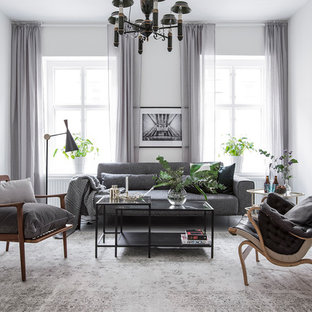 Foto på ett mellanstort minimalistiskt separat vardagsrum, med ett finrum, vita väggar, målat trägolv och vitt golv