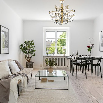 Living room - mid-sized scandinavian open concept and formal light wood floor living room idea in Stockholm with white walls