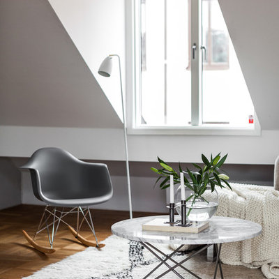 Living room - mid-sized scandinavian formal and open concept light wood floor living room idea in Stockholm with white walls, no fireplace and no tv