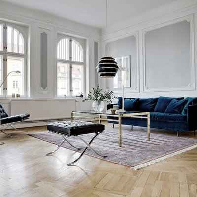Inspiration for a large scandinavian enclosed and formal light wood floor living room remodel in Malmo with gray walls and no tv