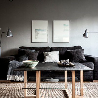 Mid-sized danish formal dark wood floor living room photo in Stockholm with gray walls, no fireplace and no tv