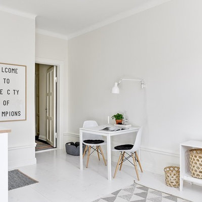 Living room - mid-sized scandinavian open concept and formal painted wood floor living room idea in Stockholm with white walls, no fireplace and no tv