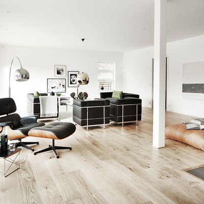 Living room - large scandinavian formal and open concept light wood floor living room idea in Malmo with white walls, no tv and no fireplace