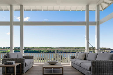 This is an example of a beach style veranda in Sydney.