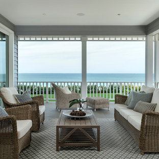 Design ideas for a large transitional backyard verandah in Perth with tile and a roof extension.