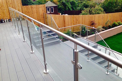 Inspiration for a large contemporary back veranda in West Midlands.