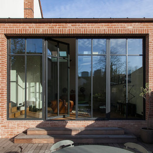 75+ Moderne Wintergärten mit verputzter Kaminumrandung Ideen & Bilder