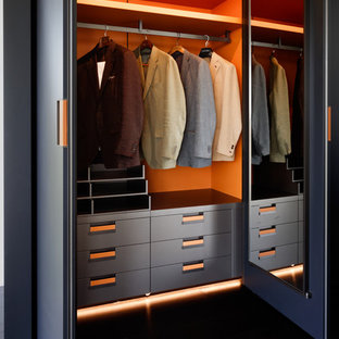 Inspiration for a medium sized contemporary standard wardrobe for men in London.