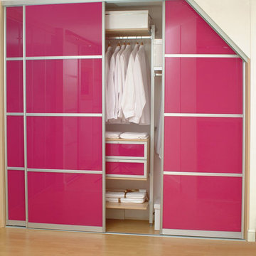Fabulous Fuchsia Pink sliding doors with decor bars. Pearwood pole-type interior