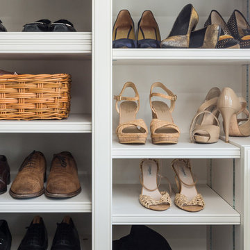 Shoe storage with adjustable shelving in bespoke dressing room