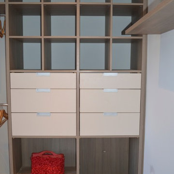 Walk in wardrobe with laundry chute on the right