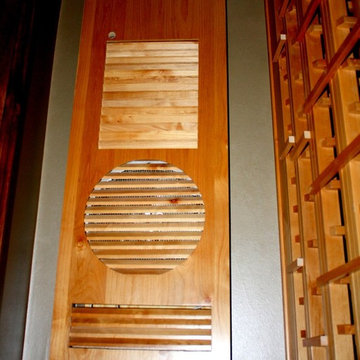 A Knotty Alder Covering and Grill, to Match the Wine Cellar Design