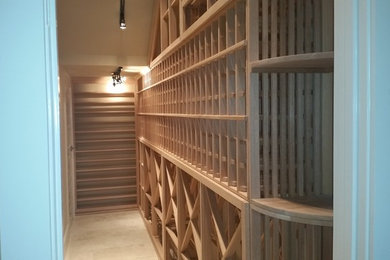 Inspiration for a timeless wine cellar remodel in Austin
