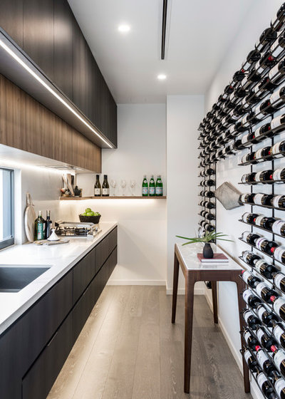 Contemporary Wine Cellar by McCarthy Homes QLD