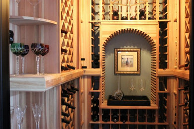 Example of a small classic wine cellar design in Atlanta with diamond bins