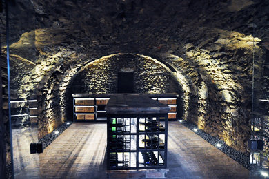 Inspiration for a rustic wine cellar in London.