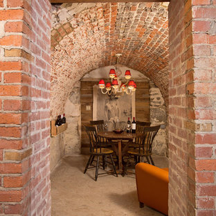 Diseño de bodega mediterránea, pequeña, con suelo de cemento
