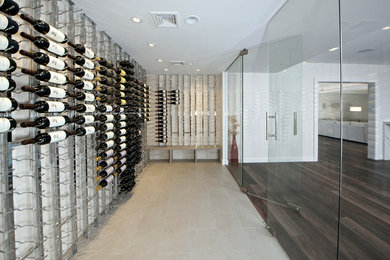 Photo of a large modern wine cellar in Bridgeport.