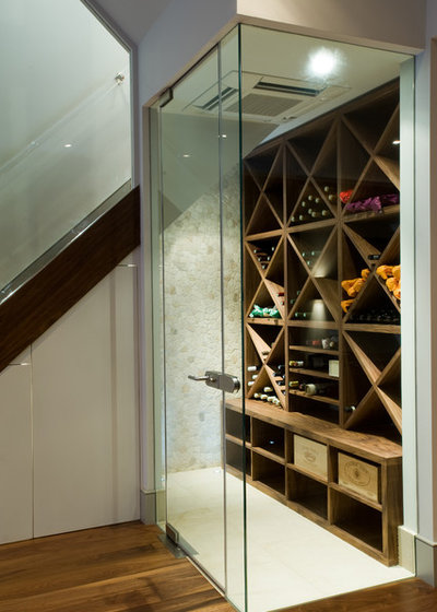 Contemporary Wine Cellar by Charlotte Candillier Interiors