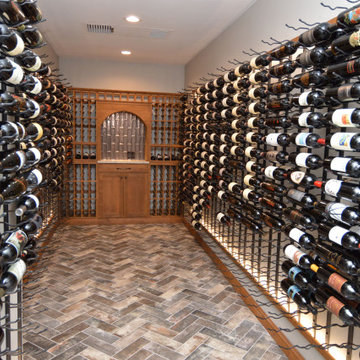 Beautiful Custom Home Wine Cellar with Metal and Wood Elements