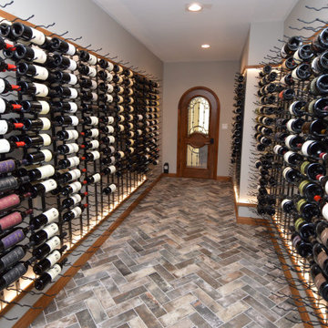 Beautiful Tile flooring Complemented the Contemporary Home wine Cellar