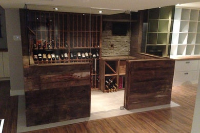 Wine cellar - industrial wine cellar idea in Montreal