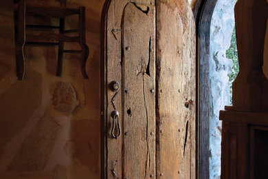 Example of an eclectic wine cellar design in Albuquerque