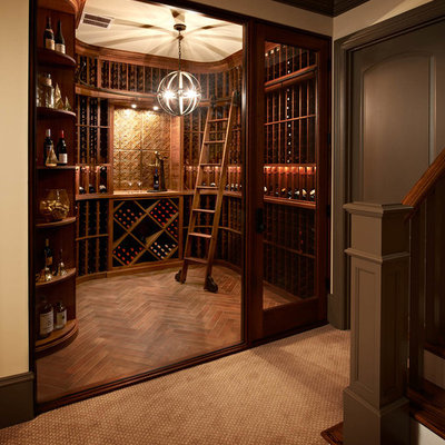 Inspiration for a timeless wine cellar remodel in Charlotte with storage racks