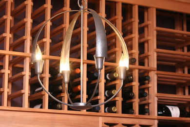 Inspiration for a modern wine cellar remodel in Cincinnati