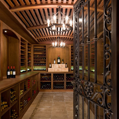 Inspiration for a large timeless wine cellar remodel in Denver with storage racks