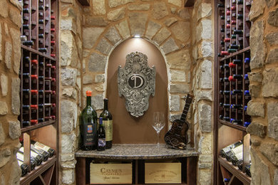 Example of a tuscan wine cellar design in Nashville
