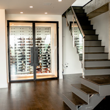 Completed Closet Custom Wine Cellar Built Near the Stairs of a High-Rise Condo i