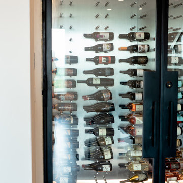 Contemporary Glass Wine Cellar Door in a Downtown Dallas Condo