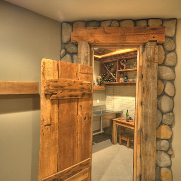 Contemporary-Rustic finished basement with reclaimed barn beams & wine room