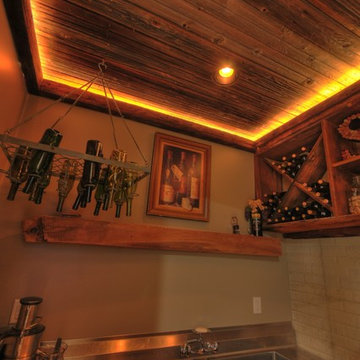Contemporary-Rustic finished basement with reclaimed barn beams & wine room
