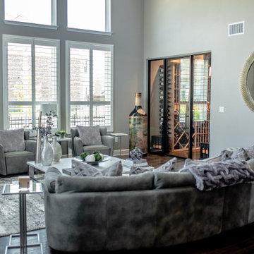Contemporary Wine Cellar in an Elegant Living Room in Dallas