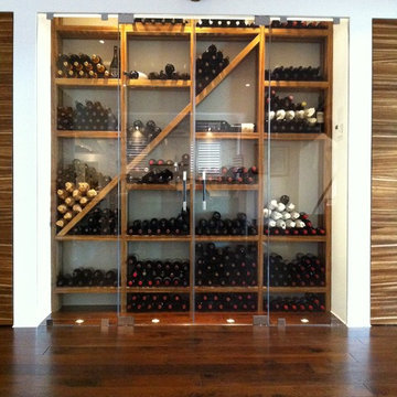 Contemporary Wine Cellar with refrigeration by Kessick