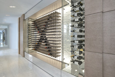 Trendy wine cellar photo in Toronto with storage racks
