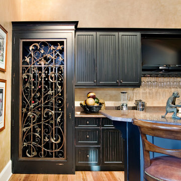 Custom Bar with Wrought Iron Cellar Door