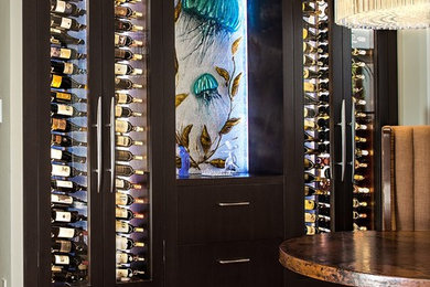 Inspiration for a modern wine cellar in Orange County.