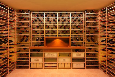 Elegant wine cellar photo in Surrey with storage racks