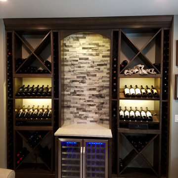 Custom wine pour station with storage.