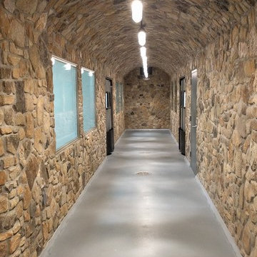 Door Artisan Cheese Cellar with Natural Stone Veneer