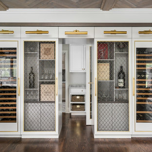 Inspiration for a mid-sized transitional medium tone wood floor and brown floor wine cellar remodel in Chicago with display racks