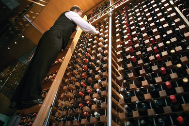 Huge trendy wine cellar photo in Chicago