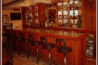 Inspiration for a timeless home bar remodel in Orange County