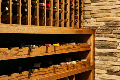 Inspiration for a craftsman wine cellar remodel in Other